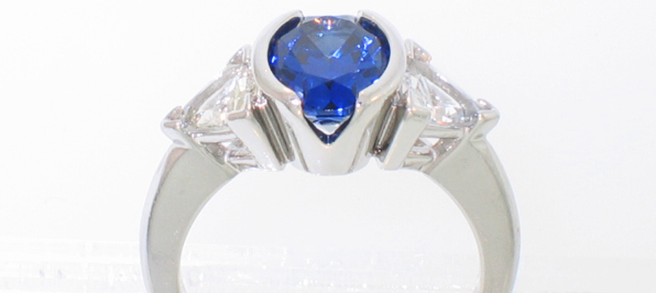 Sapphire Oval with Diamond Triangles
